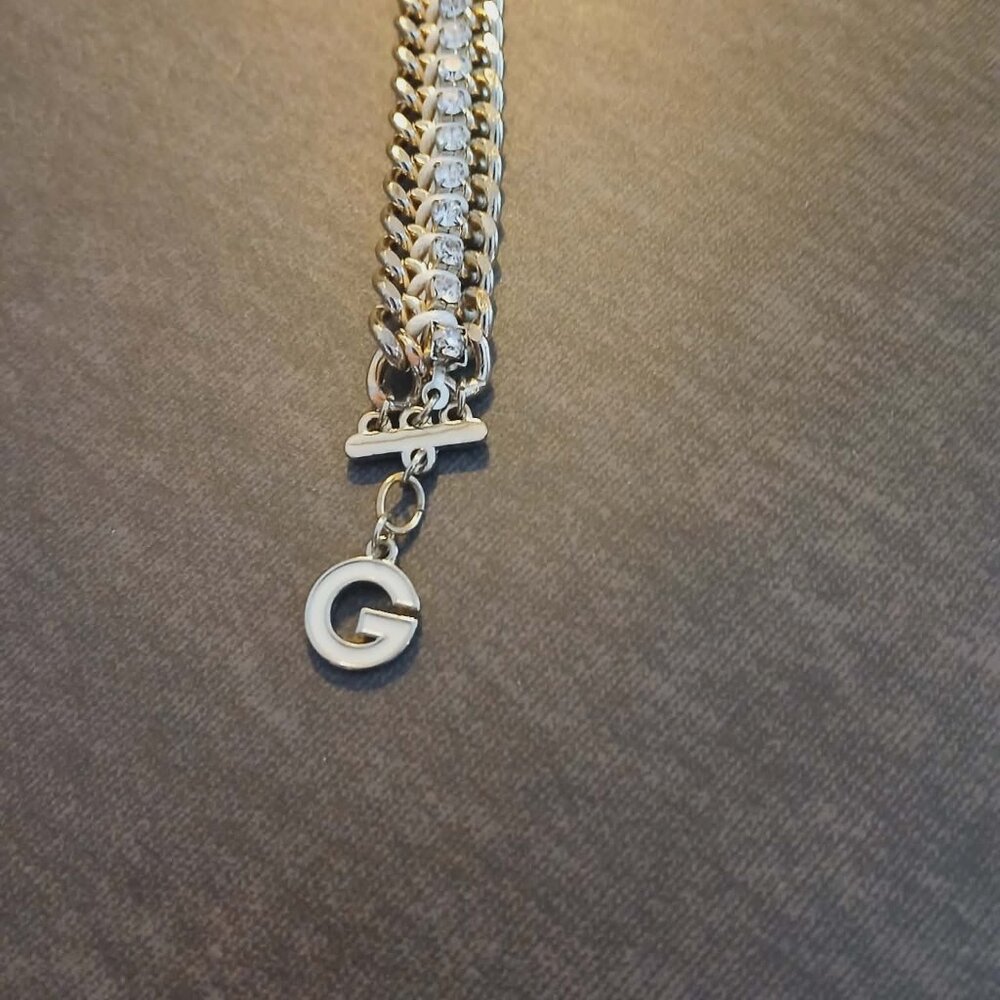 GUESS Rhinestones & Woven Cord Bracelet Double Chain Gold Tone White Enamel G